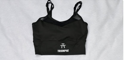 Haut sport féminin noir triomphe